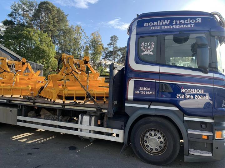 Two gravel road grader deliveries